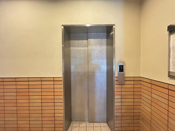�@-